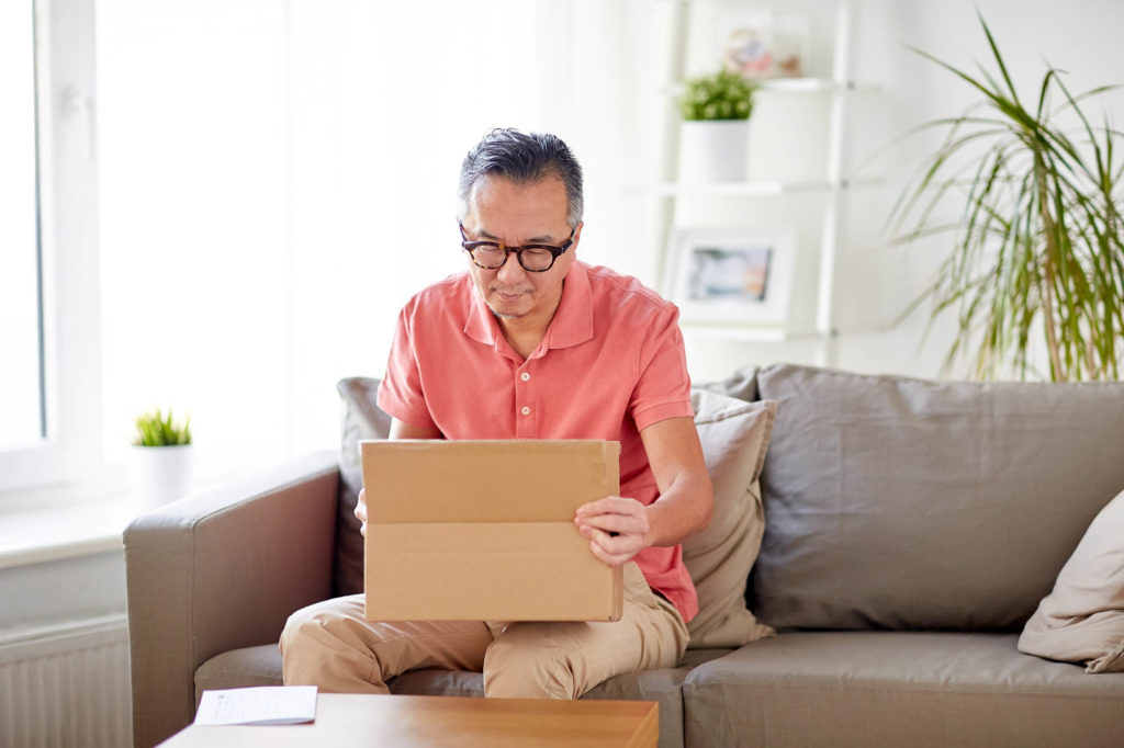 man opens a box to sell my diabetic test strips